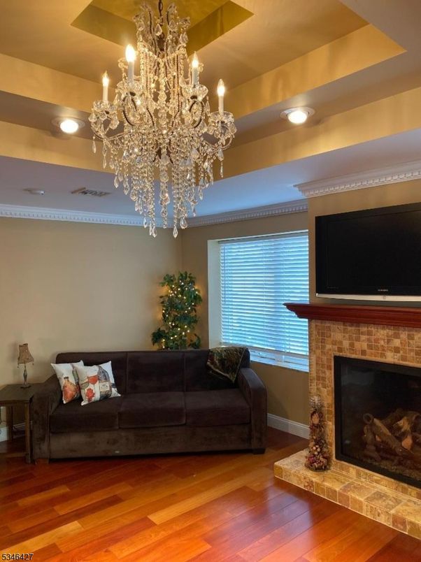 Chandelier, Fireplace, Interior, Recessed Lighting, Wood Texture Flooring
