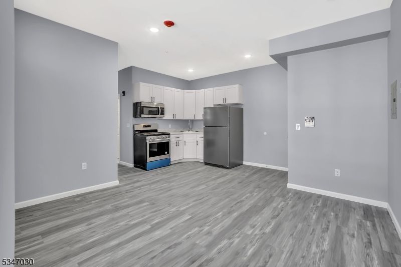 Interior, Kitchen, Recessed Lighting, Stainless Steel Appliances, Wood Texture Flooring