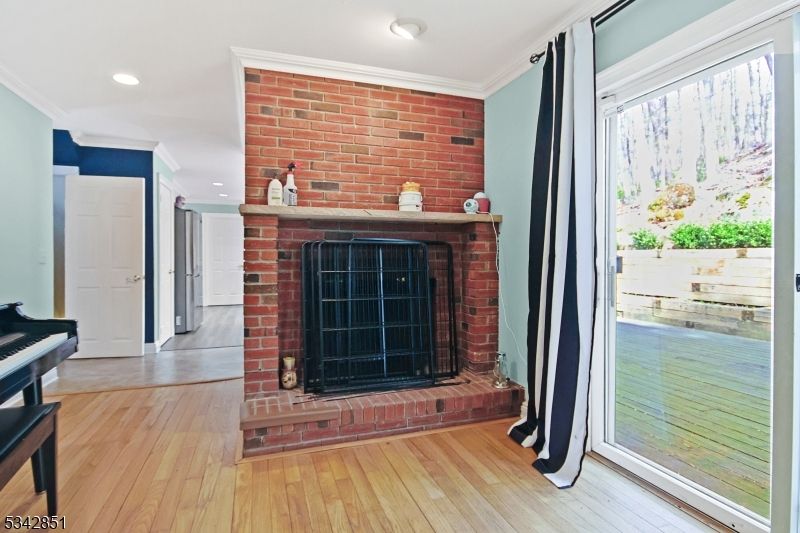 Fireplace, Interior, Recessed Lighting, Stone Walls, Wood Texture Flooring