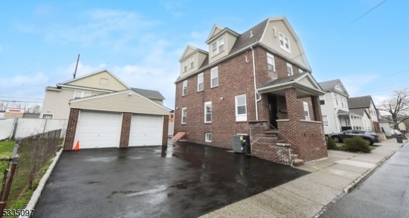 Attached, Detached Garage, Exterior, Facade, Brick Facade, Tudor Revival