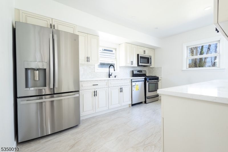 Interior, Kitchen, Marble, Recessed Lighting, Stainless Steel Appliances