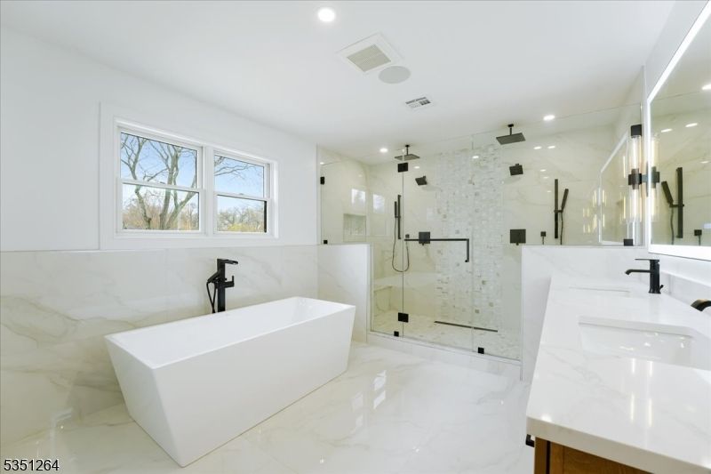 Bathroom, Dual Sink Vanities, Free Standing Baths, Glass Shower, Interior, Marble, Marble Walls, Recessed Lighting