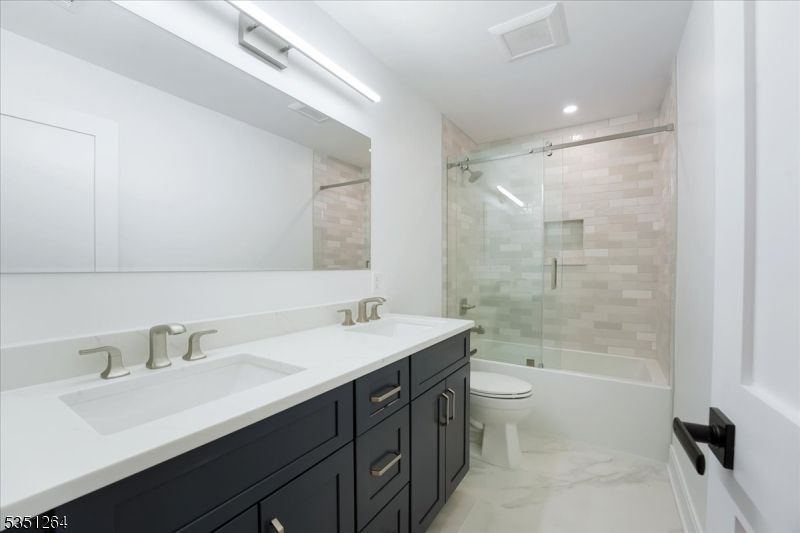 Bathroom, Dual Sink Vanities, Glass Shower, Interior, Marble, Recessed Lighting