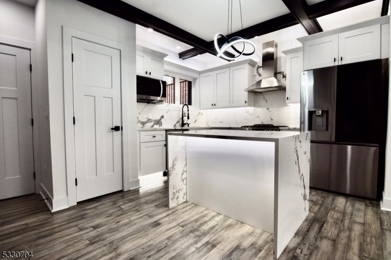 Interior, Kitchen, Marble Walls, Pendant Lights, Recessed Lighting, Stainless Steel Appliances, Wooden Beams, Wood Texture Flooring