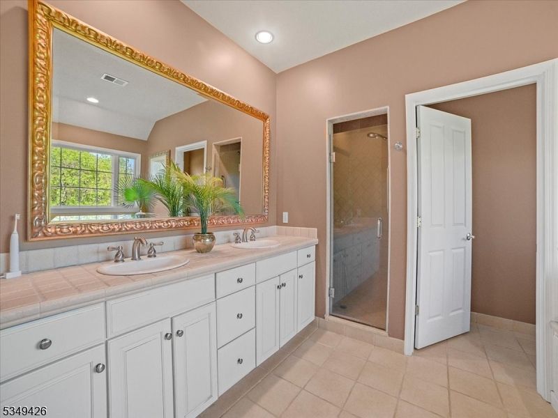 Bathroom, Dual Sink Vanities, Glass Shower, Interior, Recessed Lighting, Tile Countertops