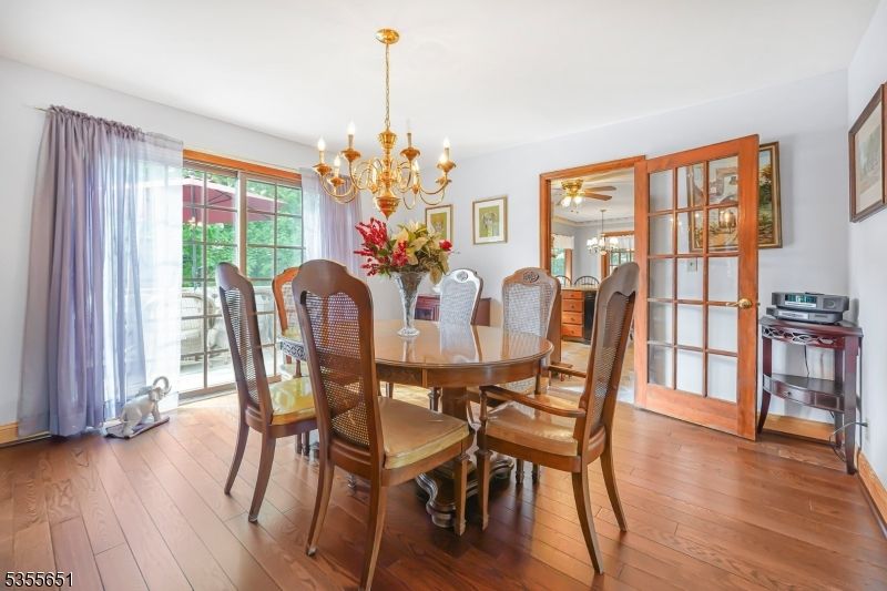 Chandelier, Dining room, Interior, Wood Texture Flooring