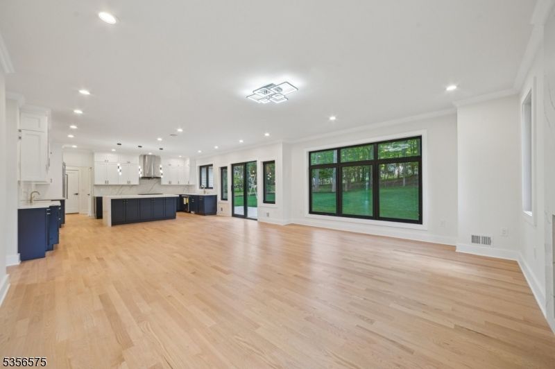 Interior, Kitchen, Marble Walls, Pendant Lights, Recessed Lighting, Wood Texture Flooring