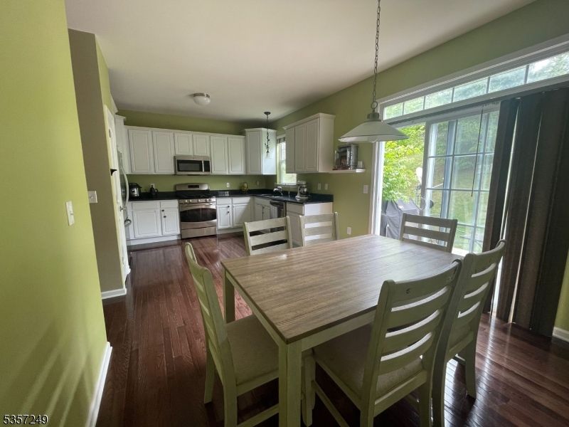 Dining room, Interior, Kitchen, Pendant Lights, Stainless Steel Appliances, Wood Texture Flooring