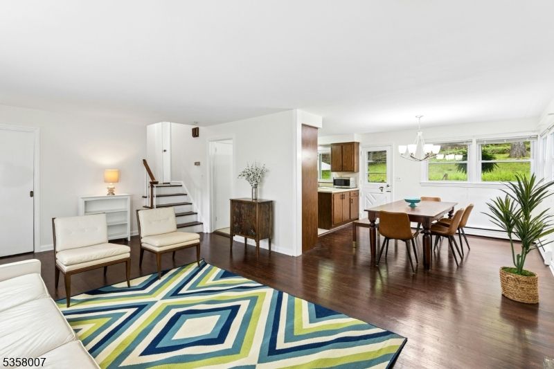 Chandelier, Dining room, Interior, Kitchen, Stainless Steel Appliances, Wood Texture Flooring
