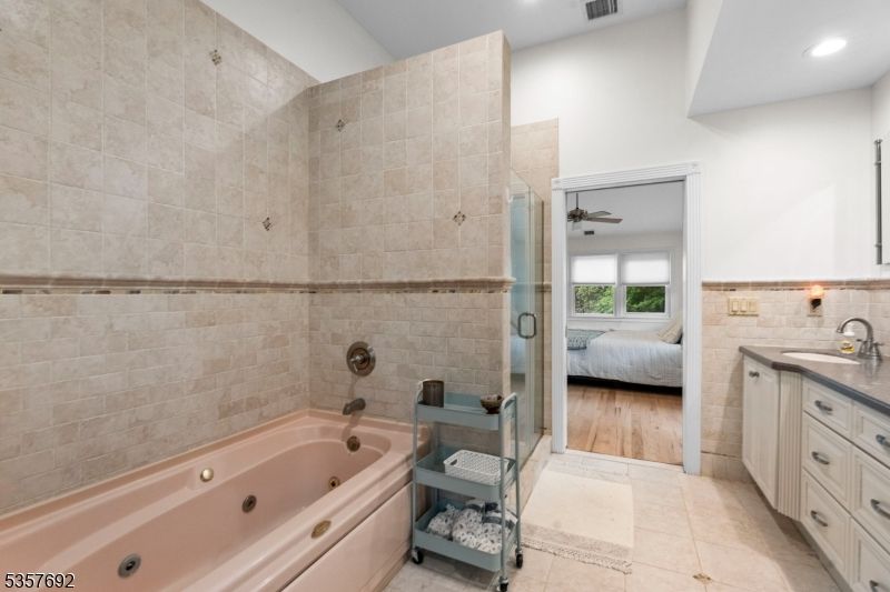 Bathroom, Bedroom, Glass Shower, Interior, Recessed Lighting, Wood Texture Flooring