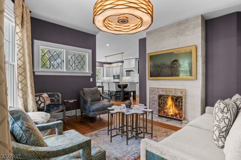 Dining room, Fireplace, Interior, Kitchen, Living room, Pendant Lights, Recessed Lighting, Wood Texture Flooring