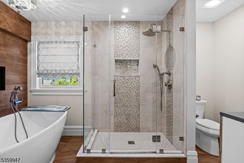 Bathroom, Free Standing Baths, Glass Shower, Interior, Recessed Lighting, Wood Texture Flooring