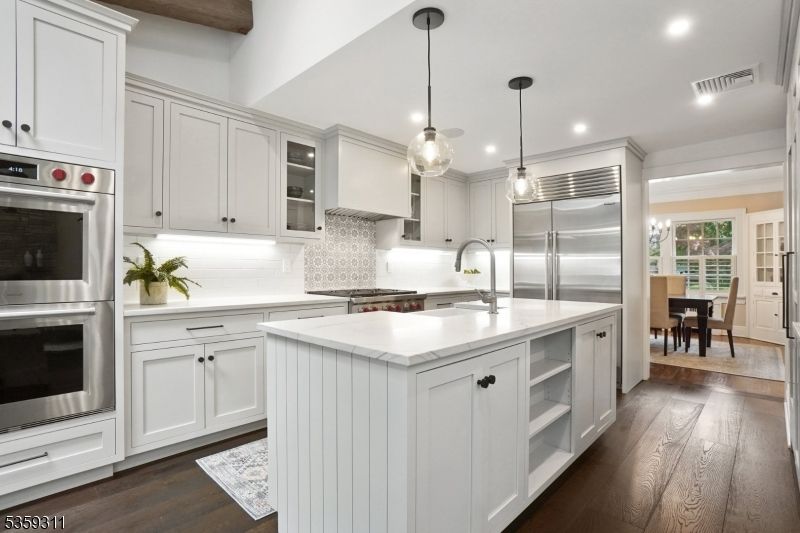 Dining room, Interior, Kitchen, Pendant Lights, Recessed Lighting, Stainless Steel Appliances, Wooden Beams, Wood Texture Flooring