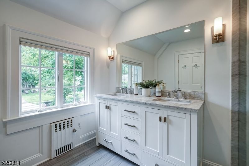 Bathroom, Dual Sink Vanities, Interior, Recessed Lighting, Wood Texture Flooring