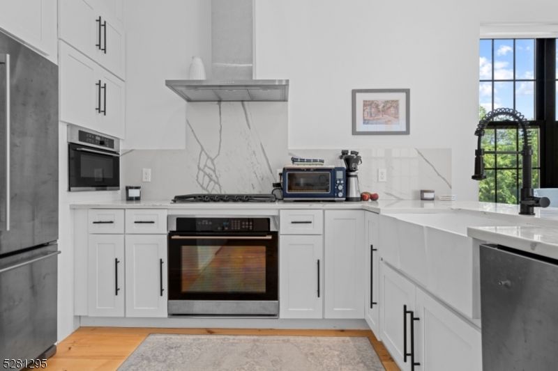 Interior, Kitchen, Marble Walls, Stainless Steel Appliances, Wood Texture Flooring