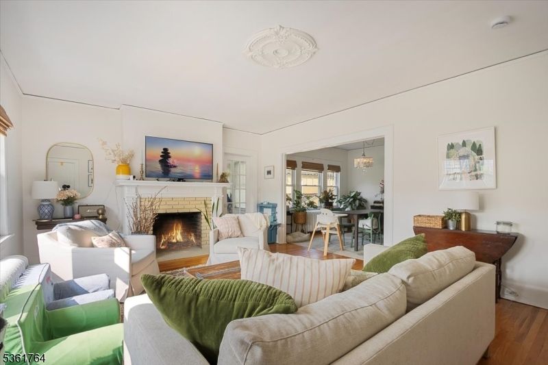 Chandelier, Dining room, Fireplace, Interior, Living room, Wood Texture Flooring