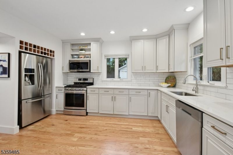 Interior, Kitchen, Recessed Lighting, Stainless Steel Appliances, Wood Texture Flooring