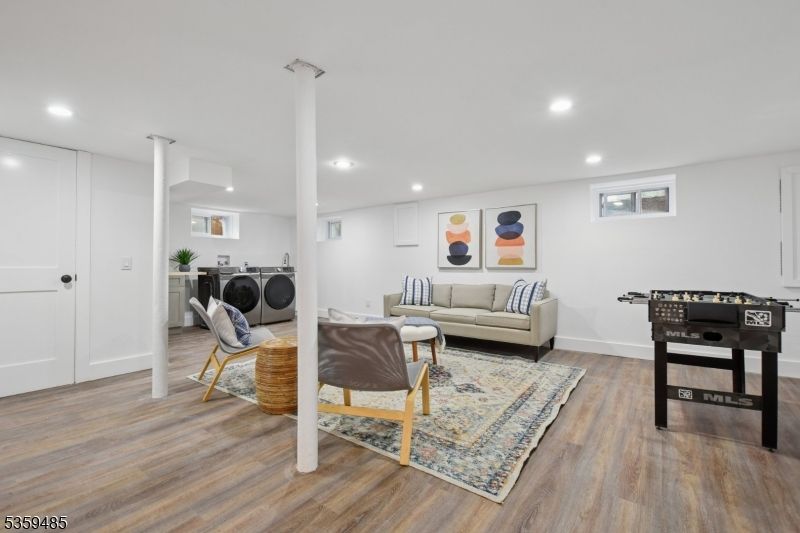 Game Room, Interior, Living room, Recessed Lighting, Washer, Wood Texture Flooring
