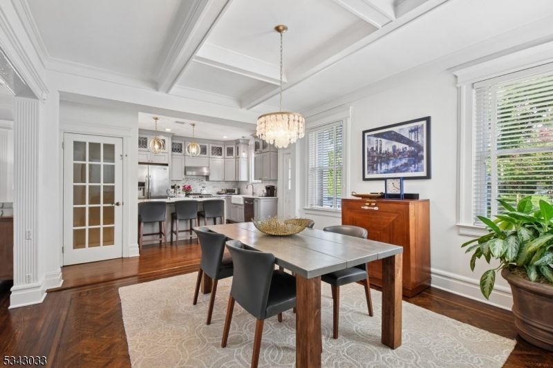 Chandelier, Dining room, Interior, Kitchen, Pendant Lights, Stainless Steel Appliances, Wood Texture Flooring