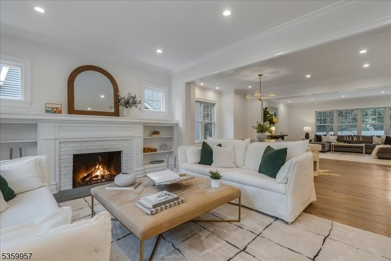 Dining room, Fireplace, Interior, Living room, Pendant Lights, Recessed Lighting, Wood Texture Flooring