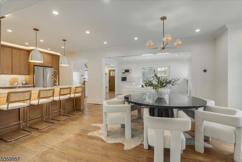 Dining room, Interior, Kitchen, Pendant Lights, Recessed Lighting, Stainless Steel Appliances, Wood Texture Flooring
