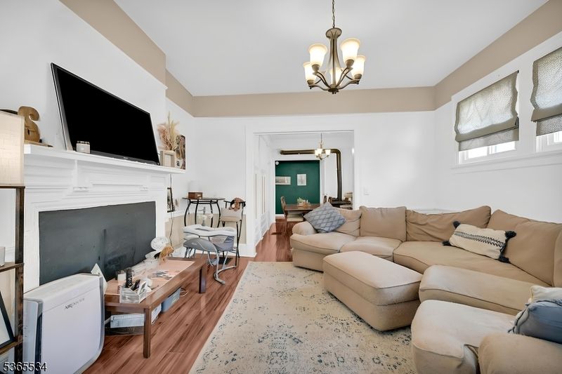 Chandelier, Fireplace, Interior, Living room, Wood Texture Flooring