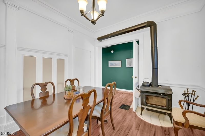 Chandelier, Dining room, Fireplace, Interior, Wood Texture Flooring