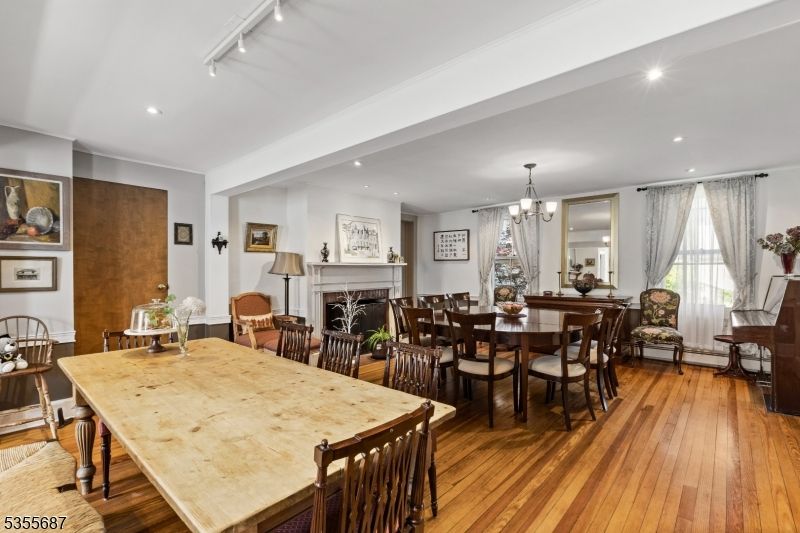 Dining room, Fireplace, Interior, Pendant Lights, Recessed Lighting, Wood Texture Flooring