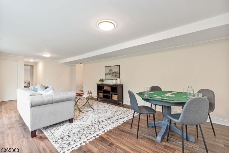 Dining room, Game Room, Interior, Living room, Recessed Lighting, Wood Texture Flooring