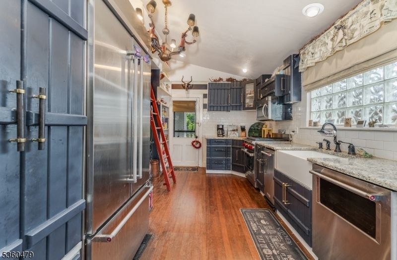 Chandelier, Interior, Kitchen, Recessed Lighting, Stainless Steel Appliances, Wood Texture Flooring