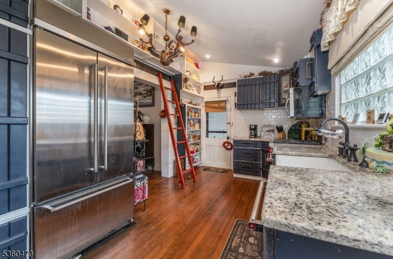 Chandelier, Interior, Kitchen, Recessed Lighting, Stainless Steel Appliances, Wood Texture Flooring