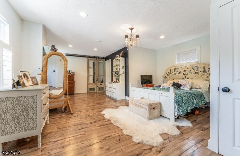 Bedroom, Chandelier, Interior, Recessed Lighting, Wood Texture Flooring
