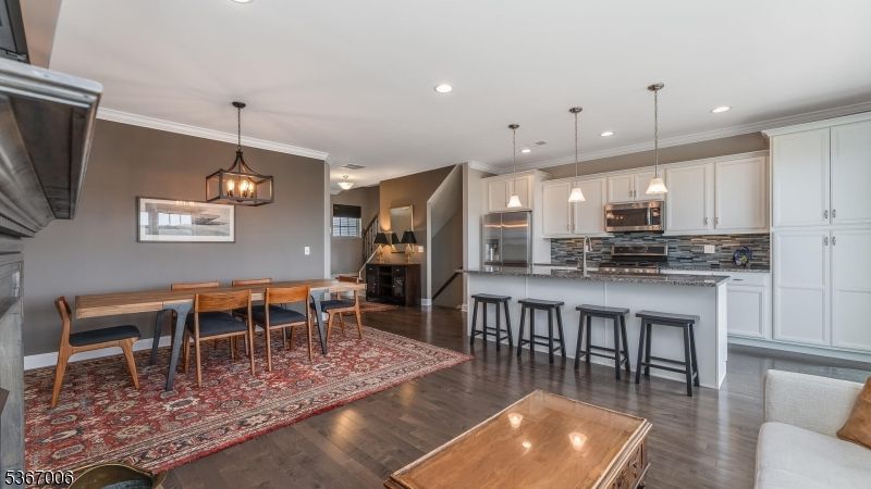 Dining room, Interior, Kitchen, Pendant Lights, Recessed Lighting, Stainless Steel Appliances, Wood Texture Flooring