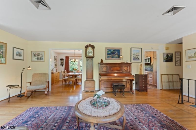 Chandelier, Dining room, Interior, Pendant Lights, Piano, Wood Texture Flooring
