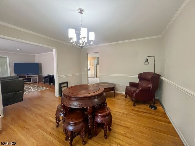 Chandelier, Dining room, Fireplace, Interior, Living room, Wood Texture Flooring