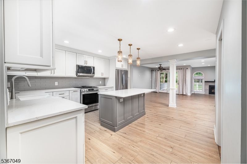Interior, Kitchen, Pendant Lights, Recessed Lighting, Stainless Steel Appliances, Wood Texture Flooring