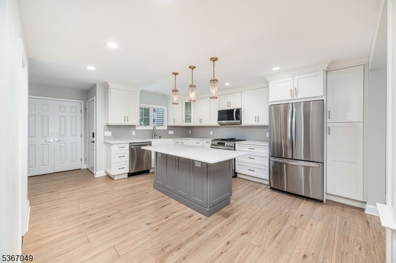 Interior, Kitchen, Pendant Lights, Recessed Lighting, Stainless Steel Appliances, Wood Texture Flooring