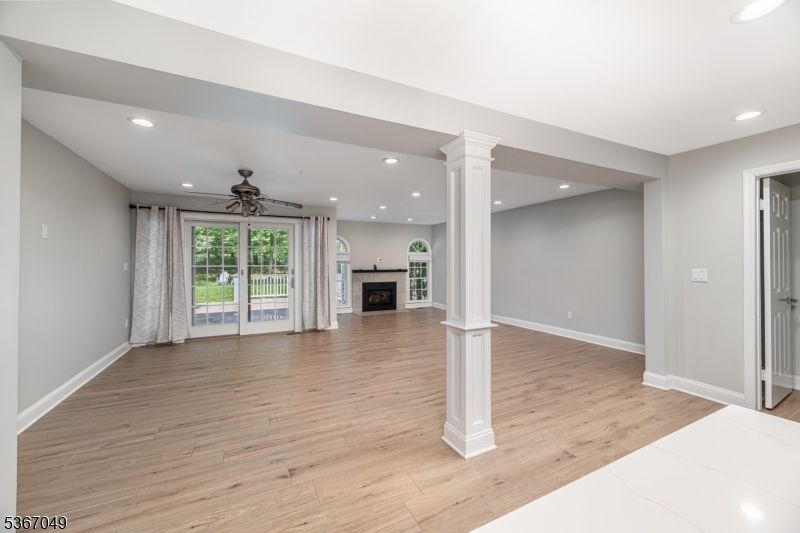 Empty room, Fireplace, Interior, Recessed Lighting, Wood Texture Flooring