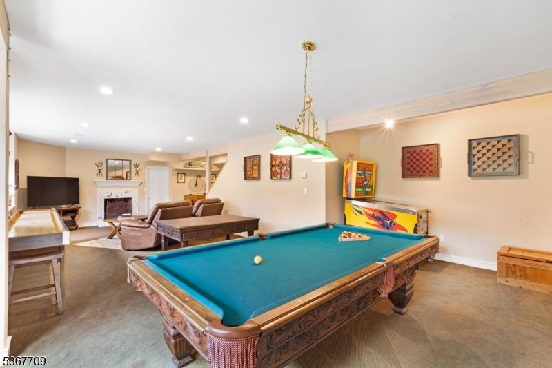 Billiard Table, Fireplace, Game Room, Interior, Living room, Pendant Lights, Recessed Lighting