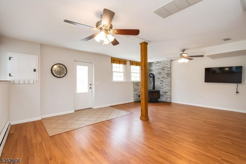 Empty room, Fireplace, Interior, Stone Walls, Wood Texture Flooring