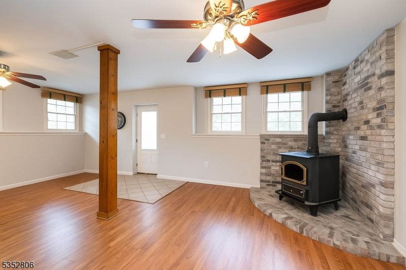 Empty room, Fireplace, Interior, Stone Walls, Wood Texture Flooring