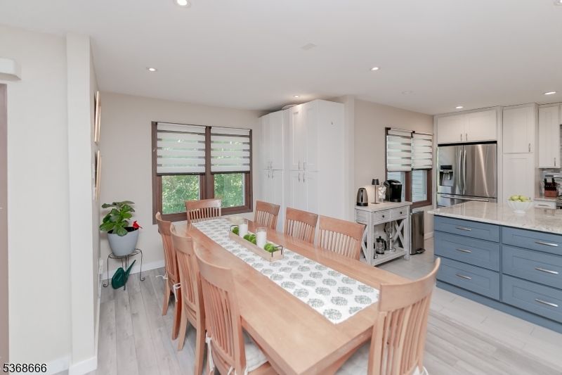 Dining room, Interior, Kitchen, Recessed Lighting, Stainless Steel Appliances, Wood Texture Flooring