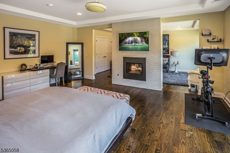 Bedroom, Fireplace, Fitness Equipment, Home Office, Interior, Recessed Lighting, Wood Texture Flooring