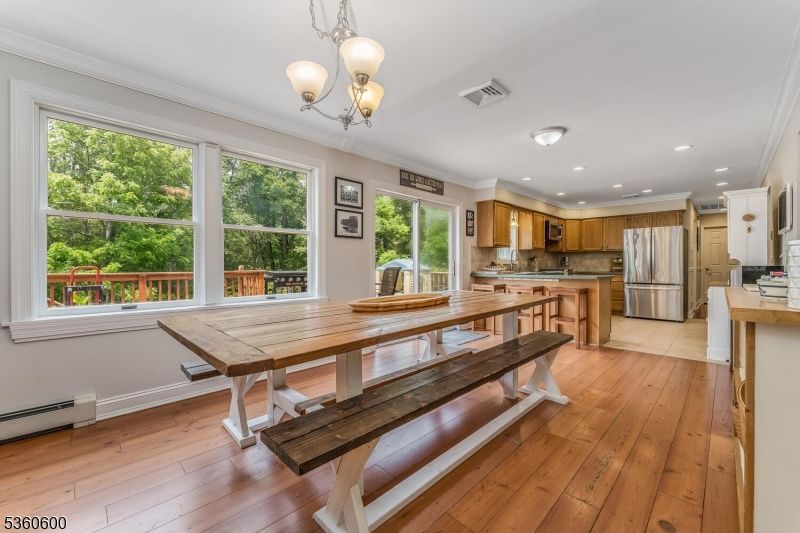Dining room, Interior, Kitchen, Recessed Lighting, Stainless Steel Appliances, Wood Texture Flooring