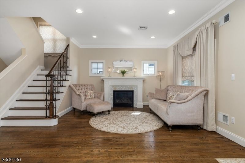 Fireplace, Interior, Living room, Recessed Lighting, Wood Texture Flooring