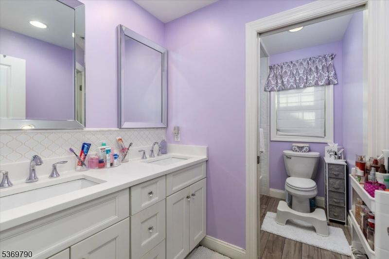 Bathroom, Dual Sink Vanities, Interior, Recessed Lighting, Wood Texture Flooring