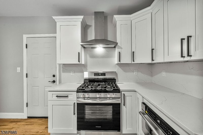 Interior, Kitchen, Marble Walls, Stainless Steel Appliances, Wood Texture Flooring