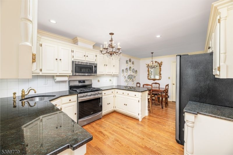 Chandelier, Dining room, Interior, Kitchen, Recessed Lighting, Wood Texture Flooring