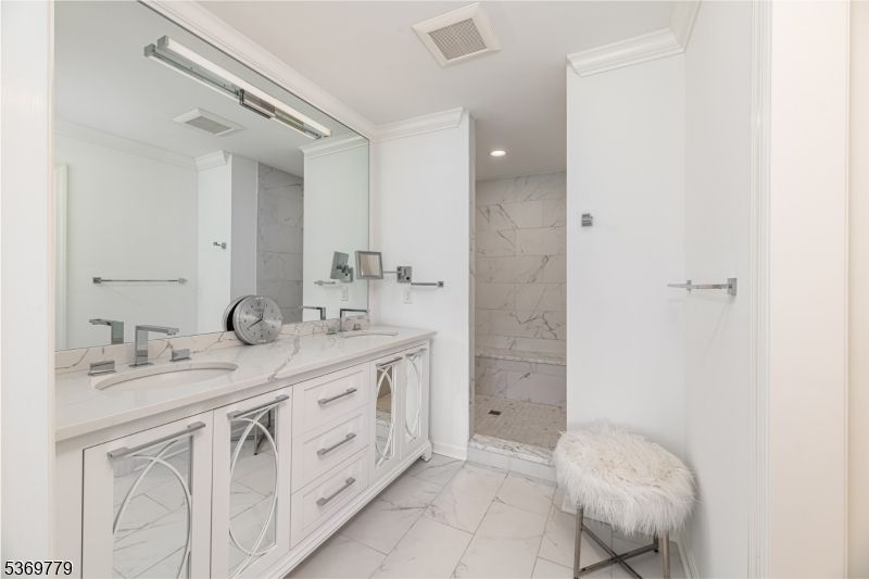 Bathroom, Dual Sink Vanities, Interior, Marble, Marble Walls, Recessed Lighting