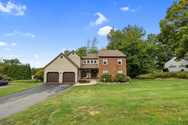 Attached, Backyard, Exterior, Facade, Brick Facade, Tudor Revival